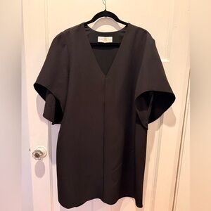 Anna Cate New Meredith Dress.  
Flattering V Neckline and elegant flowy sleeves